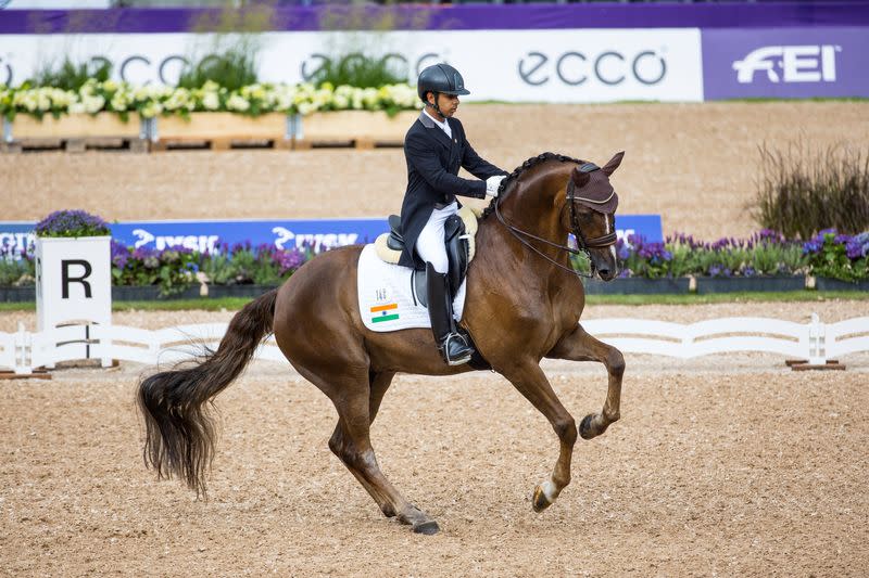 India's Anush Agarwalla rides Sir Caramello Old during Blue Hors FEI Dressage World Championship in Herning, Denmark