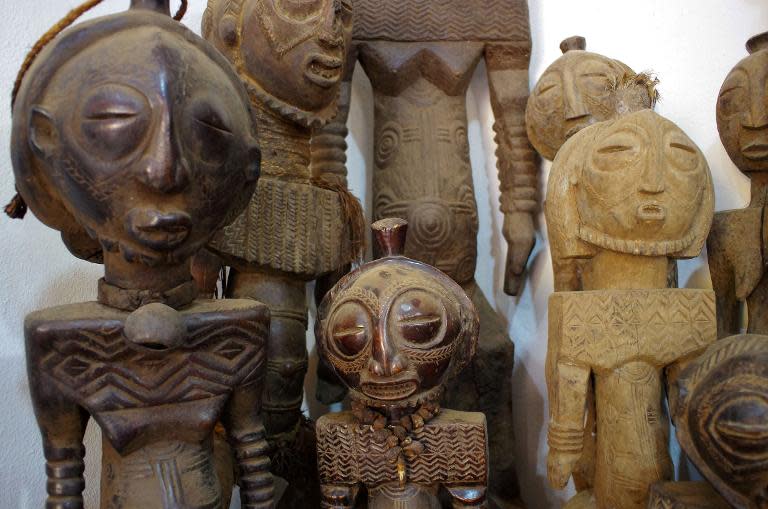 Wooden statuettes of the Buyu tribe, one of the four main ethnic groups in the Democratic Republic of the Congo's South-Kivu province, are displayed in the Kivu Museum in Bukavu on March 17, 2015