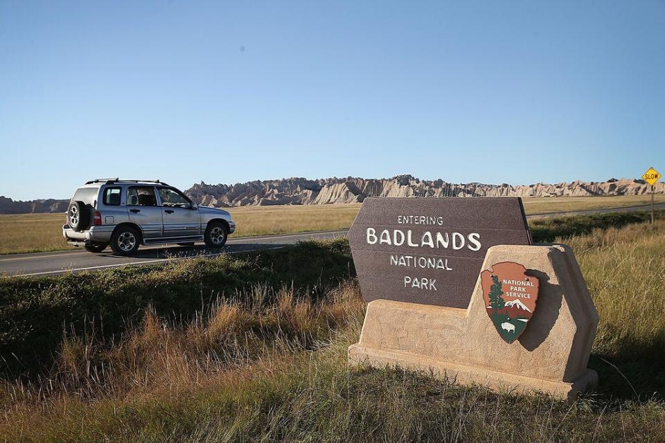 Visitors drive into Badlands National Park on October 1, 2013.