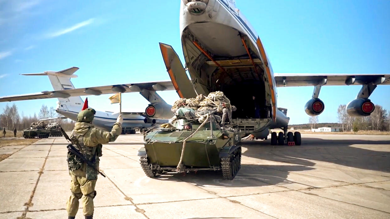 A Russian military vehicle prepares to be loaded into a plane during maneuvers in Crimea, in this image released on April 22