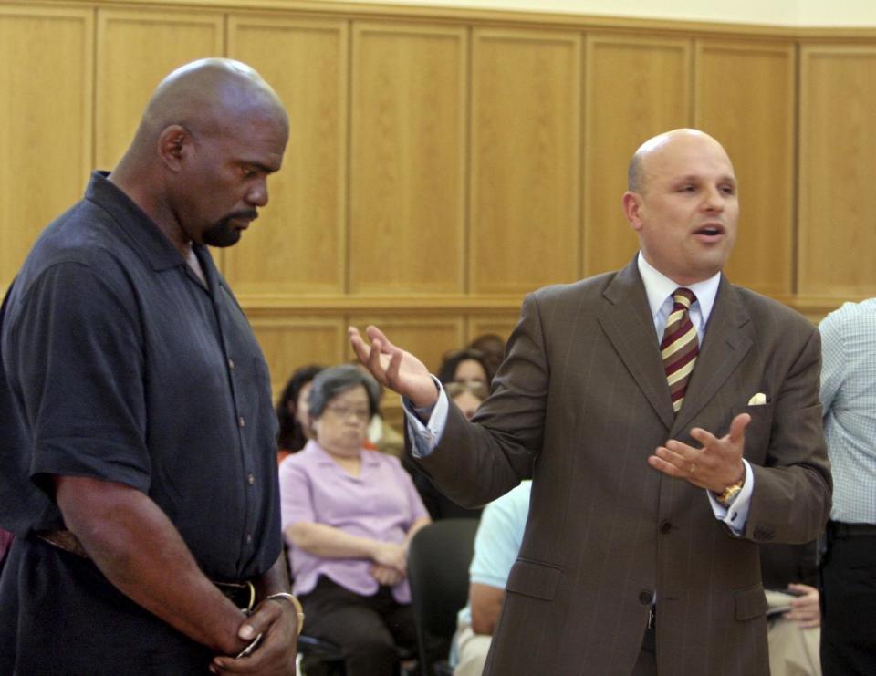 FILE- In this May 6, 2010 file photo, attorney Arthur Aidala, right addresses the court as his client, former New York Giants linebacker and Pro Football Hall of Famer Lawrence Taylor, listens, during Taylor's arraignment arraignment at Ramapo Town Court in Suffern, N.Y. Aidala, a former state prosecutor who is now a criminal defense attorney and Fox News legal analyst, is on a list of candidates to become the next U.S. Attorney for the Eastern District of New York. (AP Photo/Seth Harrison, Pool, File)