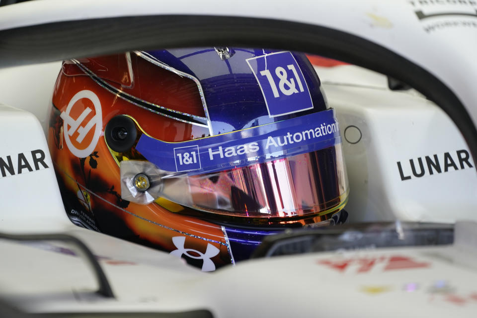 Haas driver Mick Schumacher, of Germany, sits in his car during the first practice session for the Formula One U.S. Grand Prix auto race at Circuit of the Americas, Friday, Oct. 21, 2022, in Austin, Texas. (AP Photo/Darron Cummings)