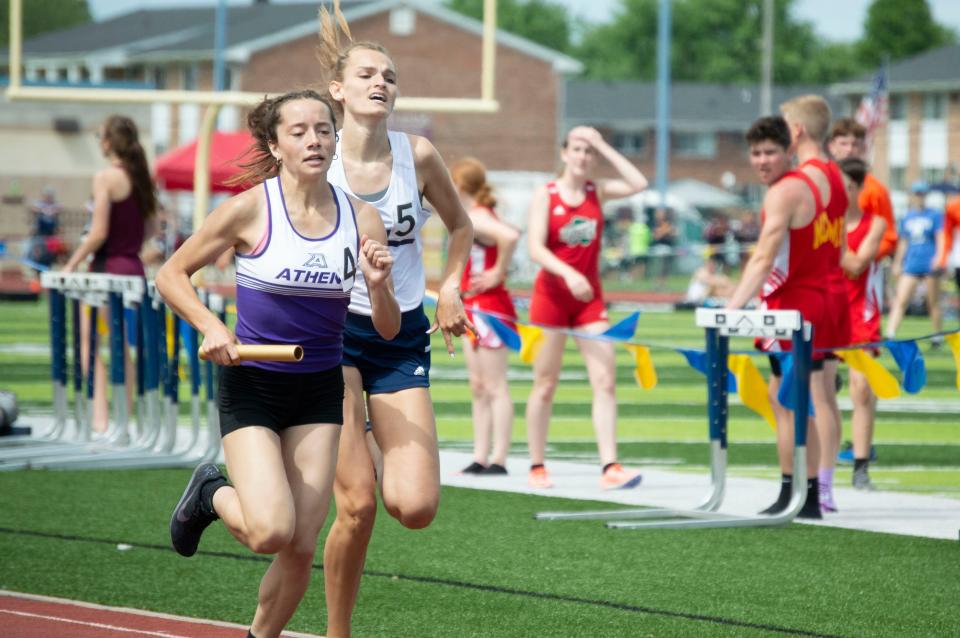 Hillsdale Academy senior Anna Roberts battles Athens in the final relay of the MITCA State Finals