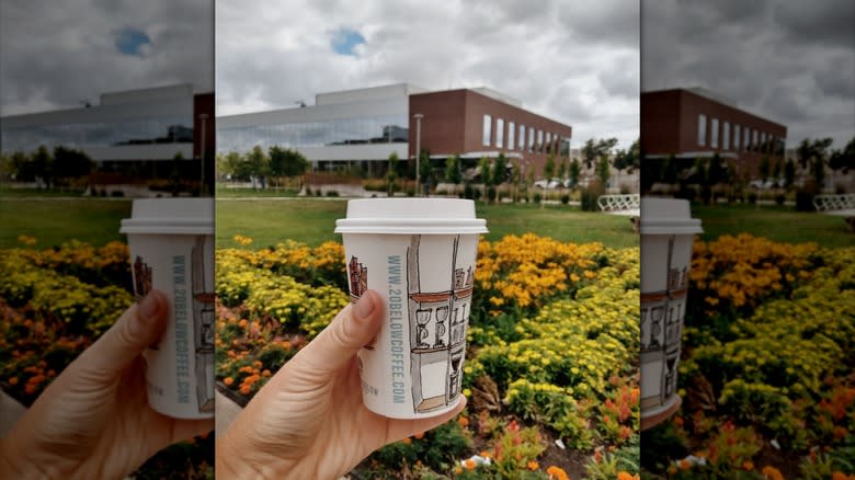 Twenty Below Coffee Co. cup in front of flowers