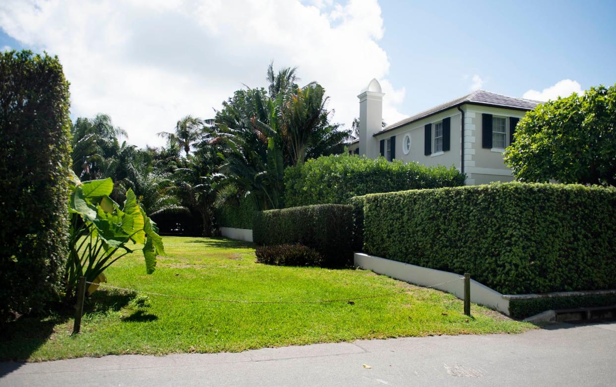 Gregory and Mardi Hayt's custom home at 332 Eden Road can be seen to the right of a vacant lot the couple just sold for a recorded $9.95 million. The lot, addressed as 324 Eden Road, has been vacant for years.