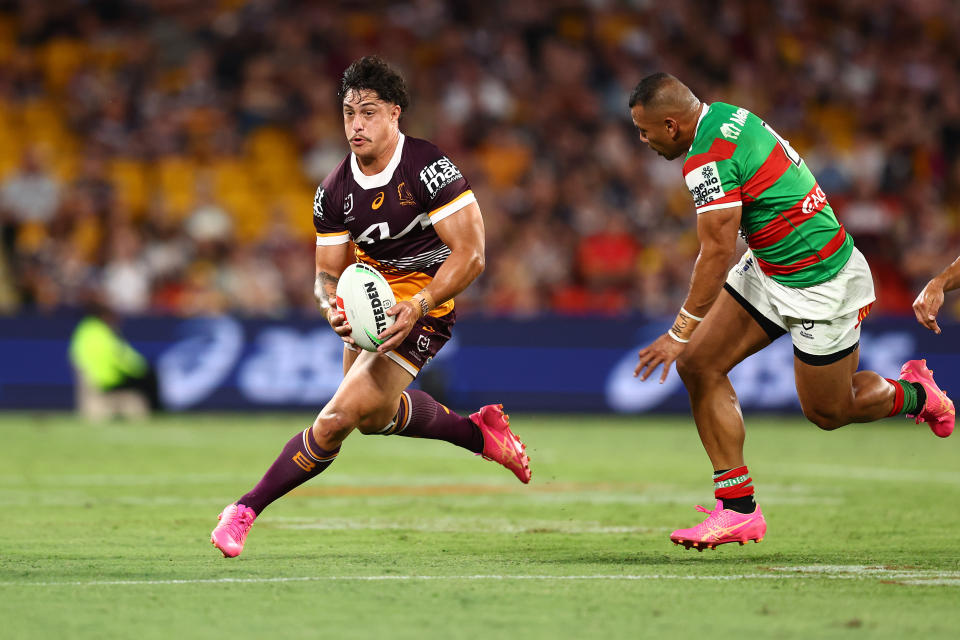 BRISBANE, AUSTRALIA - MARCH 14: Kotoni Staggs of the Broncos runs the ball during the round two NRL match between Brisbane Broncos and South Sydney Rabbitohs at Suncorp Stadium, on March 14, 2024, in Brisbane, Australia. (Photo by Chris Hyde/Getty Images)