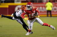 Kansas City Chiefs wide receiver Kadarius Toney (19) runs against Cincinnati Bengals cornerback Eli Apple, left, during the first half of the NFL AFC Championship playoff football game, Sunday, Jan. 29, 2023, in Kansas City, Mo. (AP Photo/Brynn Anderson)