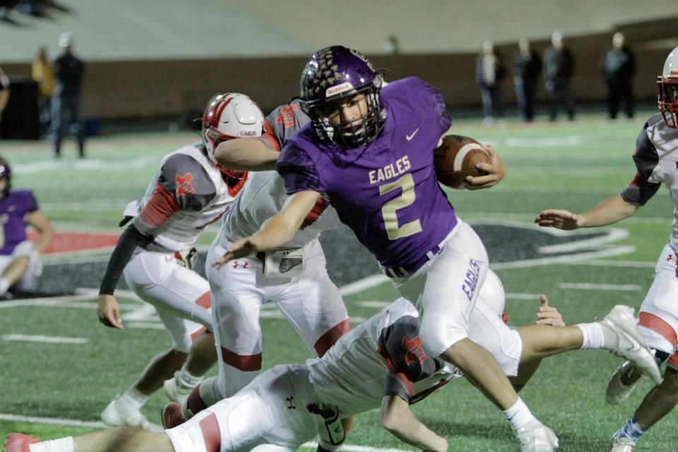 Sterling City running back Johnny Monreal (2) tries to stay on his feet against Hermleigh in the bidistrict round of the 2021 Class 1A Division I playoffs.