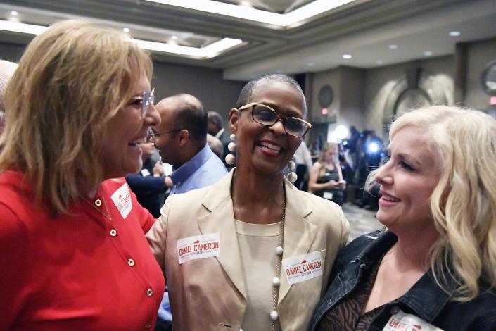 Sandra Cameron, mother of Kentucky Attorney General Daniel Cameron, center, celebrates with supporters following the announcement of his victory in the Republican primary for Kentucky Governor in Louisville, Ky., Tuesday, May 16, 2023. (AP Photo/Timothy D. Easley)