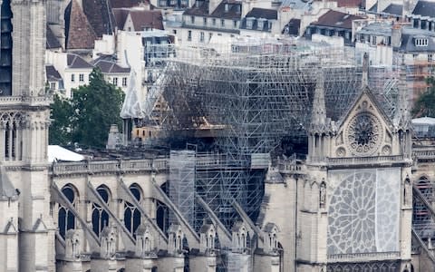 Notre-Dame lost its gothic spire in a major blaze in April - Credit: REX