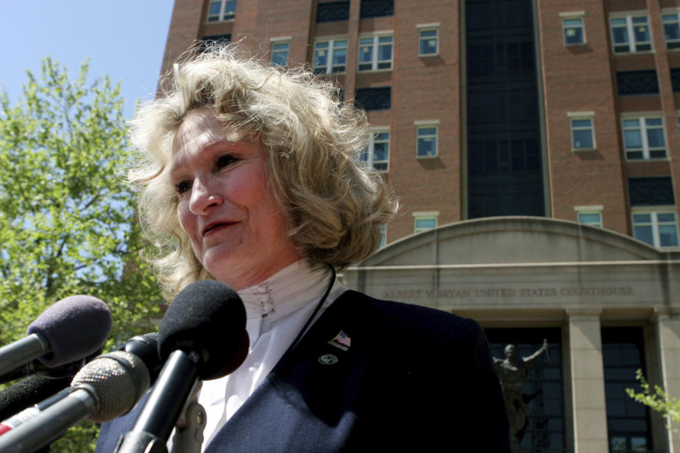 FILE - In this April 20, 2006, file photo, Alice Hoagland, whose son Mark Bingham died on United Airline's Flight 93 on Sept. 11, 2001, speaks to reporters in front of U.S. District Court in Alexandria, Va. Hoagland, beloved as a mother figure by players in the global gay rugby movement her own son Mark Bingham helped establish shortly before he perished as one of the heroes of Flight 93, died Dec. 22, 2020, in her sleep at her home in California after battling Addison’s disease. (AP Photo/Caleb Jones, File)