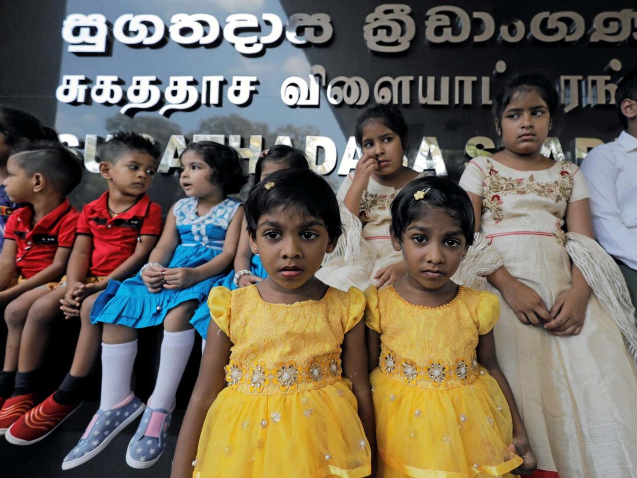 Twins pose for photographs during an event to attempt to break the world record for the biggest gathering of twins in Colombo, Sri Lanka January 20, 2020: REUTERS