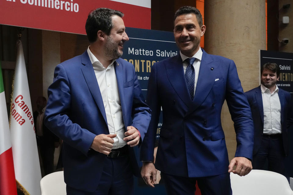 The League leader Matteo Salvini, left, arrives to his book presentation flanked by General Roberto Vannacci, one of the League candidates at the next European Parliament election, in Rome, Tuesday, April 30, 2024. (AP Photo/Alessandra Tarantino)