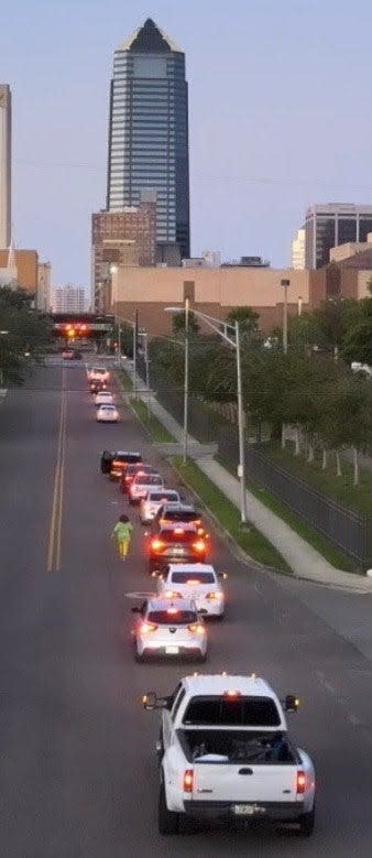 A motorcade of about 15 cars, a van and a bus heads out of Jacksonville on April 19 to join a rally against Gov. Ron DeSantis' redistricting plan in Tallahassee.