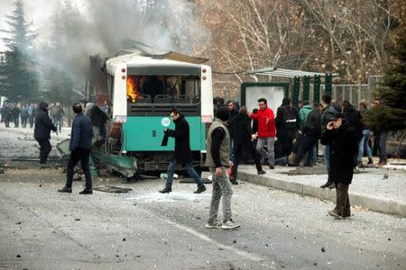 People react after a bus was hit by an explosion in Kayseri, Turkey, December 17, 2016. Turan Bulut/ Ihlas News Agency via REUTERS