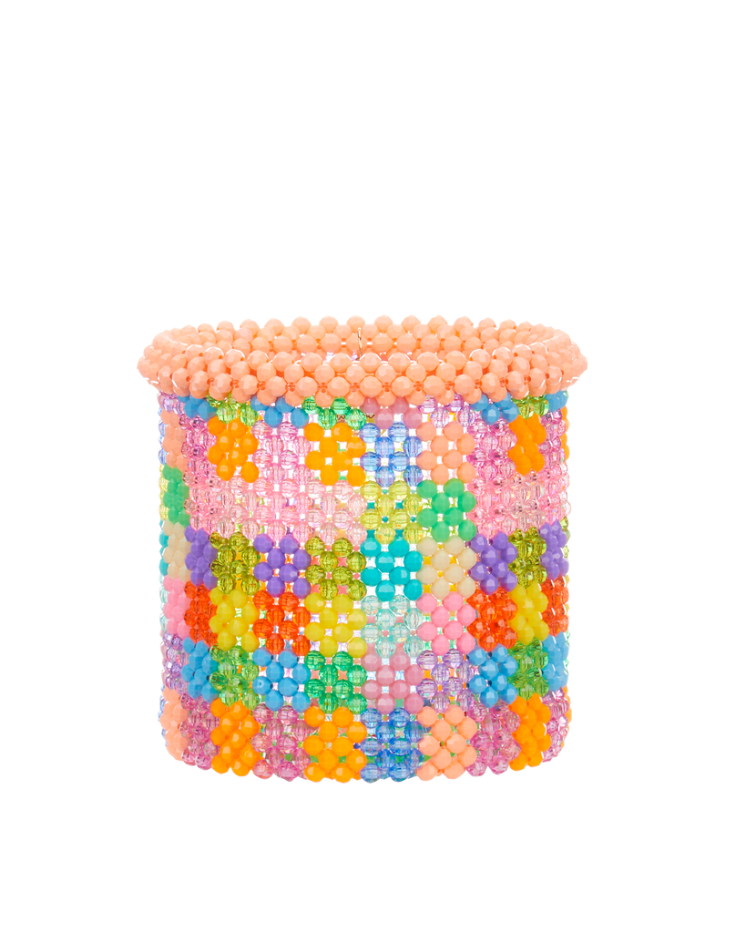 <p><a href="https://www.susanalexandra.com/collections/all/products/beaded-planter-matinee" rel="nofollow noopener" target="_blank" data-ylk="slk:Shop Now;elm:context_link;itc:0;sec:content-canvas" class="link ">Shop Now</a></p><p>Beaded Planter</p><p>susanalexandra.com</p><p>$140.00</p><span class="copyright">Susan Alexandra</span>