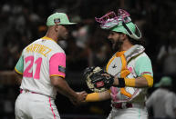 San Diego Padres pitcher Nick Martinez, left, and San Diego Padres catcher Brett Sullivan celebrate after their team's victory over San Francisco Giants during a baseball game in Mexico City, Saturday, April 29, 2023. (AP Photo/Fernando Llano)