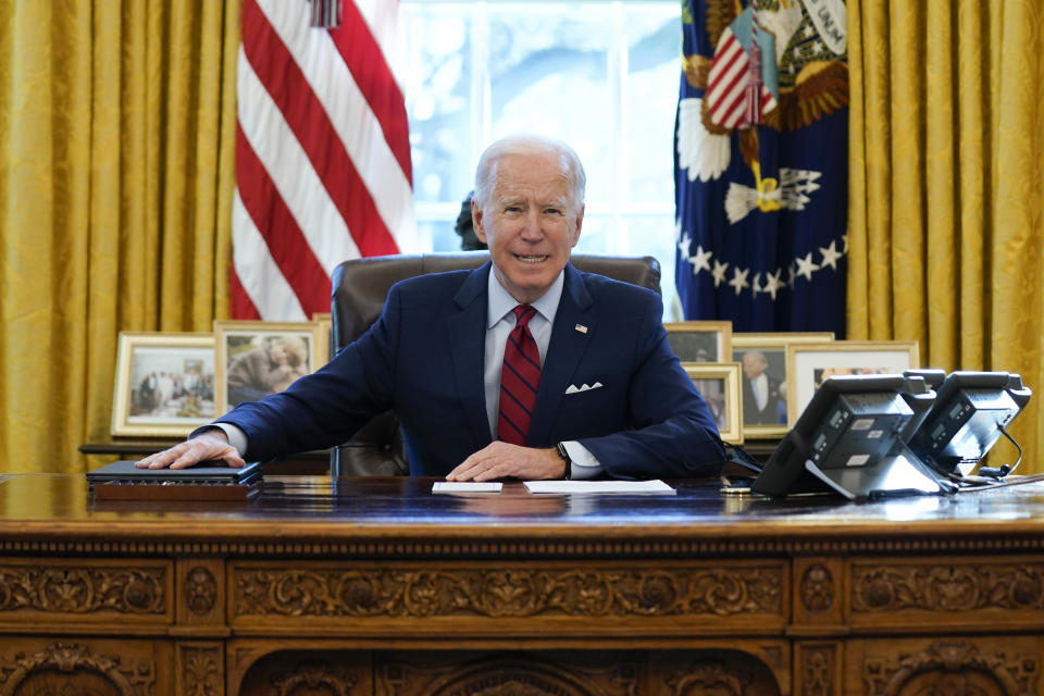 President Joe Biden delivers remarks on health care, in the Oval Office of the White House, Thursday, Jan. 28, 2021, in Washington. (AP Photo/Evan Vucci)