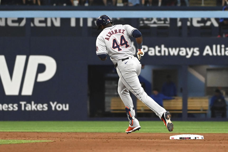 Houston Astros' Yordan Alvarez (44) rounds the bases after hitting a solo home run against the Toronto Blue Jays during the sixth inning of a baseball game in Toronto on Wednesday, July 3, 2024. (Jon Blacker/The Canadian Press via AP)