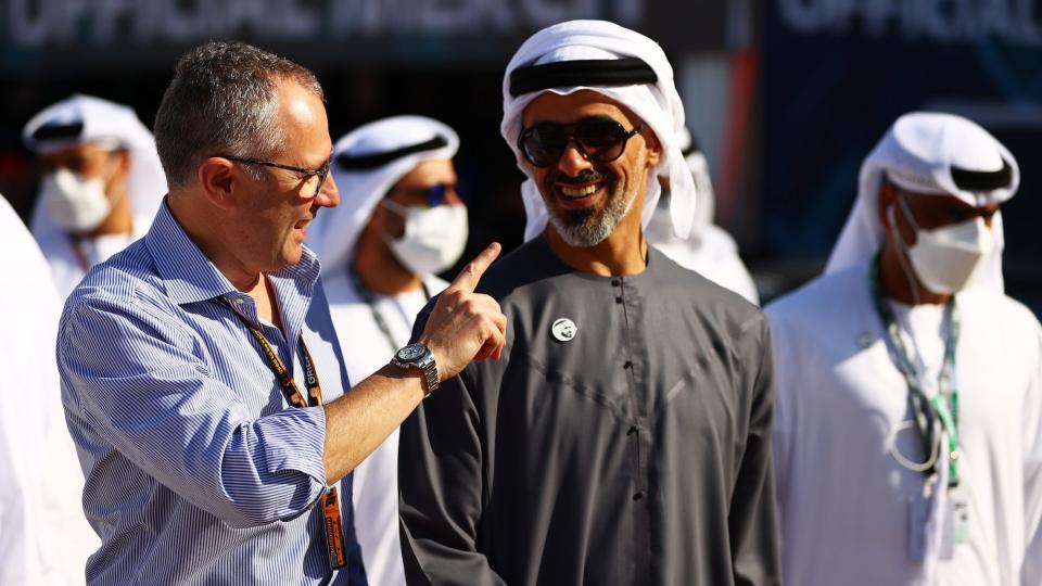 Stefano Domenicali, CEO of the Formula One Group, talks with Sheikh Khaled bin Mohamed bin Zayed Al Nahyan during previews ahead of the F1 Grand Prix of Abu Dhabi at Yas Marina Circuit.