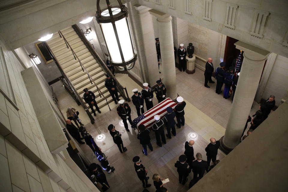 A military honor guard with Bush's casket inside the Capitol.