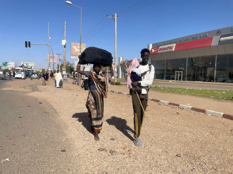 People gather at the station to flee from Khartoum