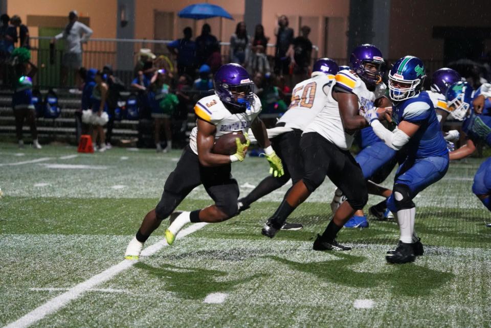 Boynton Beach star Bobby T. Smith (3) carries the ball against Somerset-Canyons on Sept. 29, 2023.