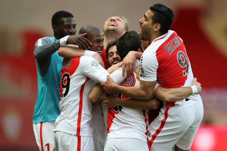 Monaco players celebrate after Moutinho scores their second goal against Bordeaux on March 11, 2017 at the Louis II Stadium in Monaco