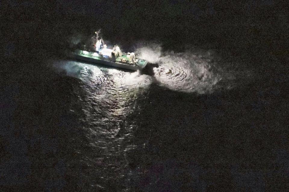 A Japan's coast guard vessel conducts search and rescue operation around the site where a U.S. military Osprey aircraft was believed to crash in the sea off Yakushima Island, Kagoshima prefecture, southern Japan Wednesday, Nov. 29, 2023 (AP)