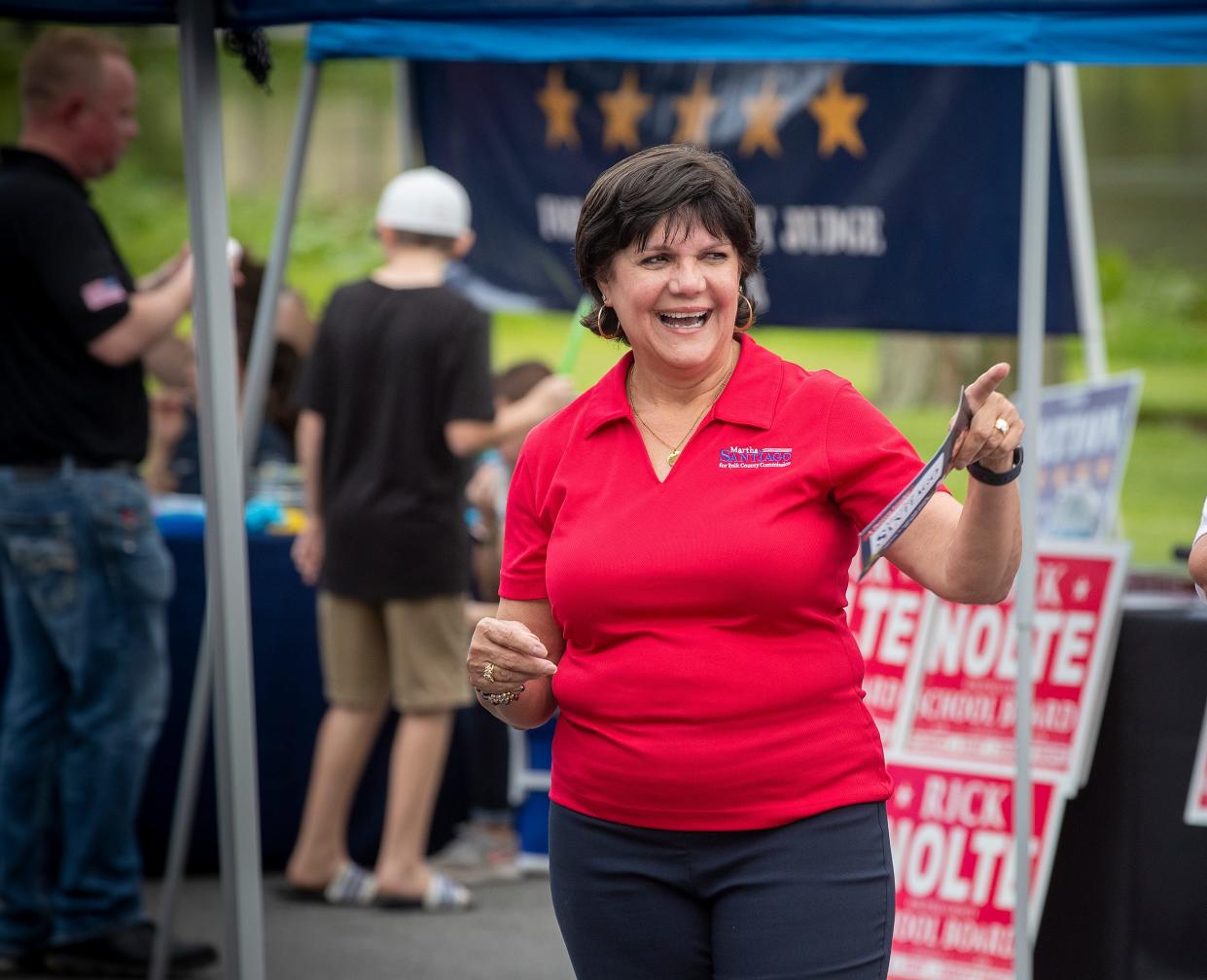 County Commission  candidate Martha Santiago during the Politics In The Park event in front of the Lakeland Chamber of Commerce on Lake Morton in Lakeland Fl. Tuesday August 9,  2022.  ERNST PETERS/ THE LEDGER