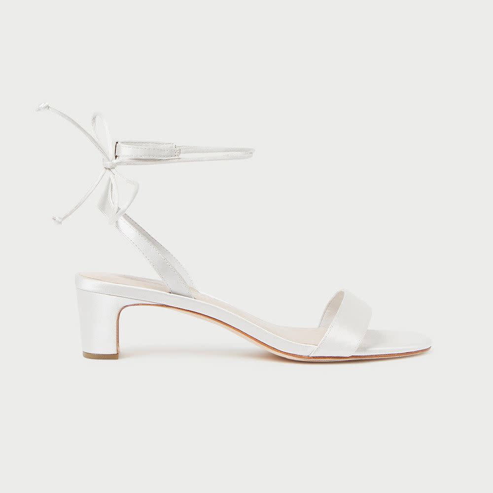 <p><a href="https://go.redirectingat.com?id=74968X1596630&url=https%3A%2F%2Floefflerrandall.com%2Fproducts%2Fjackie-cream-mid-heel-sandal&sref=https%3A%2F%2Fwww.elle.com%2Ffashion%2Fshopping%2Fg39980280%2Fcomfortable-wedding-shoes%2F" rel="nofollow noopener" target="_blank" data-ylk="slk:Shop Now;elm:context_link;itc:0;sec:content-canvas" class="link rapid-noclick-resp">Shop Now</a></p><p>Jackie Cream Mid-Heel Sandal</p><p>Loeffler Randall</p><p>$295.00</p>