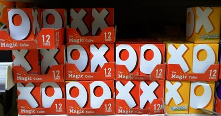 Boxes of OXO stock cubes are seen on the shelf of a supermarket in Manchester