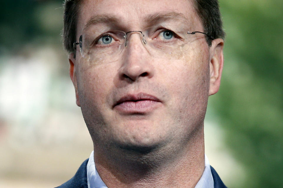 FILE - In this Tuesday, Oct. 2, 2018 file photo, Ola Kallenius, member of the Board of Management of Daimler AG. Group Research & Mercedes-Benz Cars Development, speaks to the media during a media preview at the Auto show in Paris. Daimler AG, the maker of Mercedes-Benz luxury cars, says it lost 1.2 billion euros ($1.3 billion) in the second quarter as the company booked 4.2 billion euros in one-time charges for troubles with diesel vehicles and air bag recalls. The quarterly loss reported Wednesday was the company's first since 2009 and a bumpy start for new CEO Ola Kallenius, who took over from Dieter Zetsche on May 22 and since then has had to issue two profit warnings. (AP Photo/Thibault Camus, File)