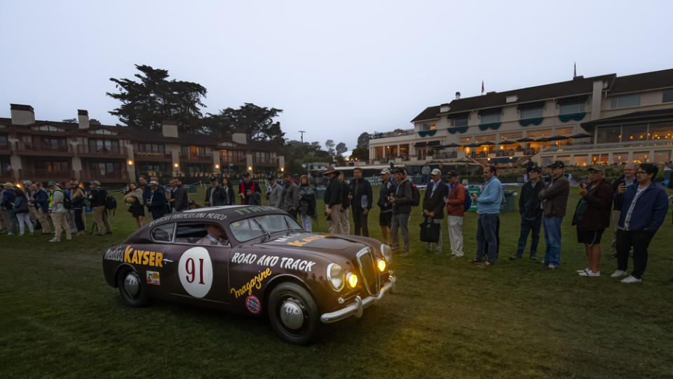 Determined attendees arrive early to watch the show cars take their positions, a tradition known as Dawn Patrol. - Credit: Tom O'Neal, courtesy of Rolex.