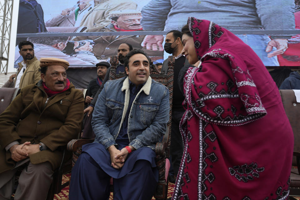 Bilawal Bhutto Zardari, center, Chairman of Pakistan People's Party talks with party's aids during an election campaign rally, in Bhalwal, Pakistan, Wednesday, Jan. 24, 2024. (AP Photo/Anjum Naveed)