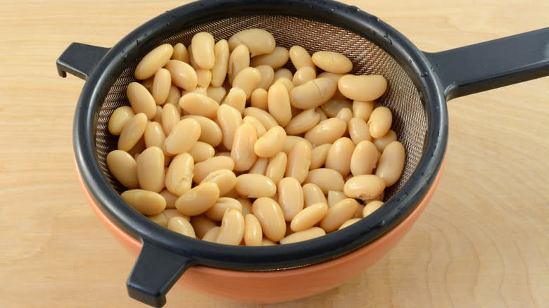 rinsed white beans in sieve