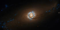 NGC 1097, conocido como 'El Anillo de Fuego'.