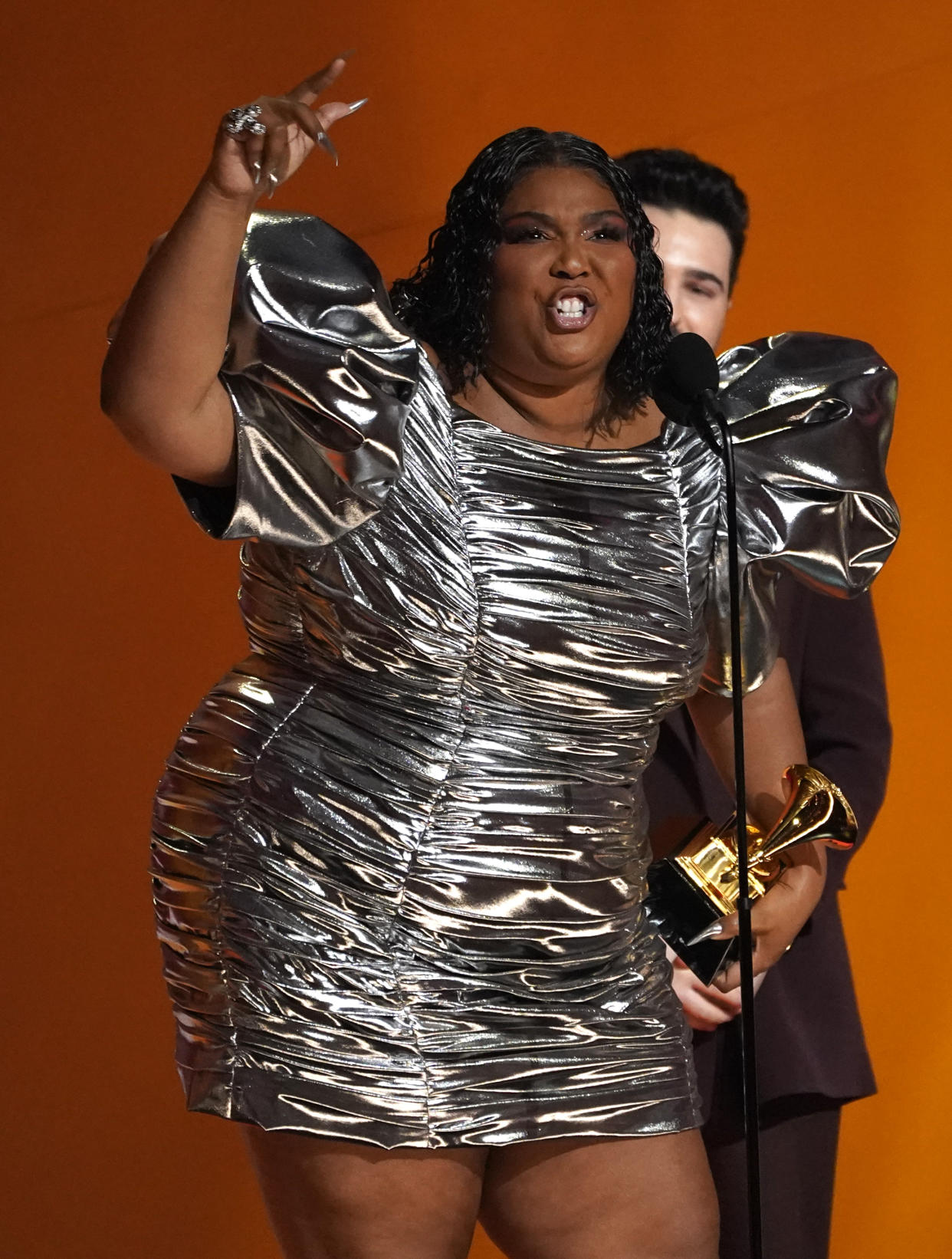 Lizzo accepts the award for record of the year for "About Damn Time" at the 65th annual Grammy Awards on Sunday, Feb. 5, 2023, in Los Angeles. (AP Photo/Chris Pizzello)