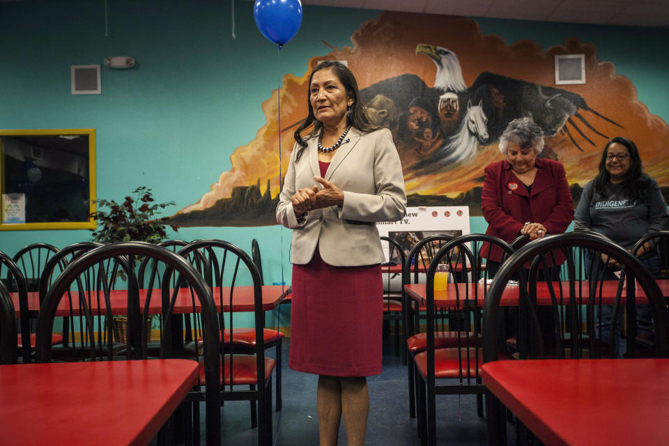 FILE - In this Tuesday, Nov. 6, 2018 file photo, New Mexico Democratic congressional candidate Deb Haaland speaks to supporters during her visit to the Albuquerque Indian Center for the Native Vote Celebration in Albuquerque, N.M., on midterms election night. Haaland and Kansas Democrat Sharice Davids were elected the first two Native American women to serve in Congress. Haaland who won in New Mexico's 1st congressional district and Davids who won in Kansas' 3rd congressional district will join U.S. Reps. Tom Cole, who is Chickasaw, and Markwayne Mullin, an enrolled citizen of the Cherokee Nation, in the House. (AP Photo/Juan Labreche, File)