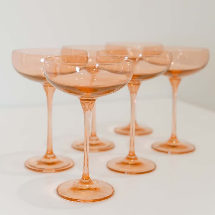 <p><a href="https://go.redirectingat.com?id=74968X1596630&url=https%3A%2F%2Fwww.westelm.com%2Fproducts%2Flcl-estelle-colored-glass-champagne-coupe-d9580%2F&sref=https%3A%2F%2Fwww.cosmopolitan.com%2Fstyle-beauty%2Ffashion%2Fg37222274%2F7th-anniversary-gift-ideas%2F" rel="nofollow noopener" target="_blank" data-ylk="slk:Shop Now;elm:context_link;itc:0;sec:content-canvas" class="link ">Shop Now</a></p><p>Champagne Coupe (set of 6)</p><p>$205.00</p><p>westelm.com</p>