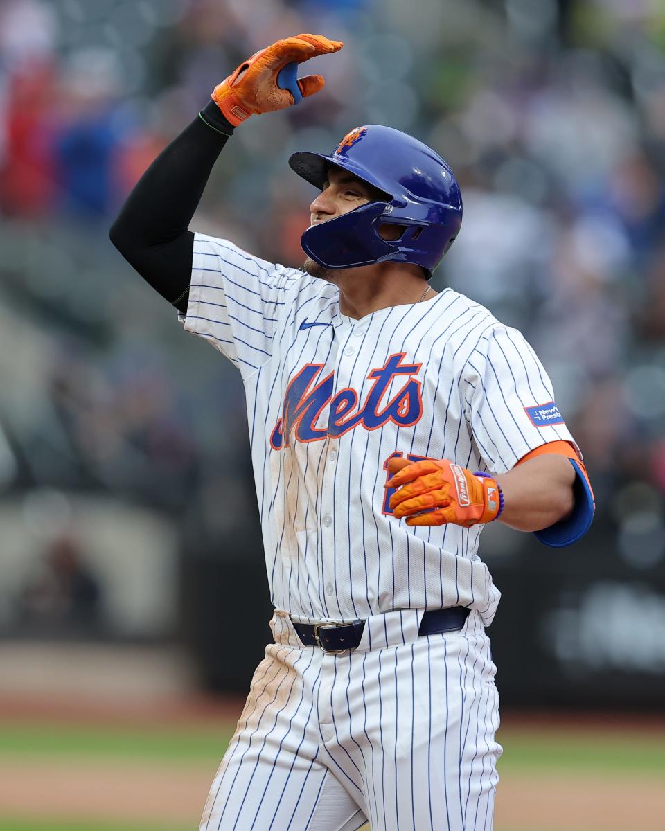 New York Mets right fielder Tyrone Taylor (15) reacts after his two run single against the Pittsburgh Pirates during the sixth inning on April 17, 2024, at Citi Field.