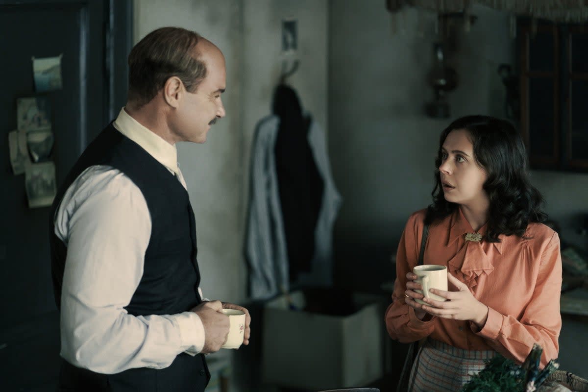 Liev Shreiber, left, plays Otto Frank, in new series A Small Light, while Bel Powley, right, plays Miep Gies, who was an employee and friend of the Franks before the war (National Geographic for Disney/Martin Mlaka)