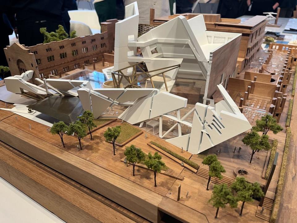 A model of the Royal Ontario Museum's redesign is displayed during an announcement held by the institution in Toronto on Wednesday Feb. 14, 2024. The ROM is redesigning its first floor, expanding its galleries, and making ground level exhibits free to visitors, officials announced.
