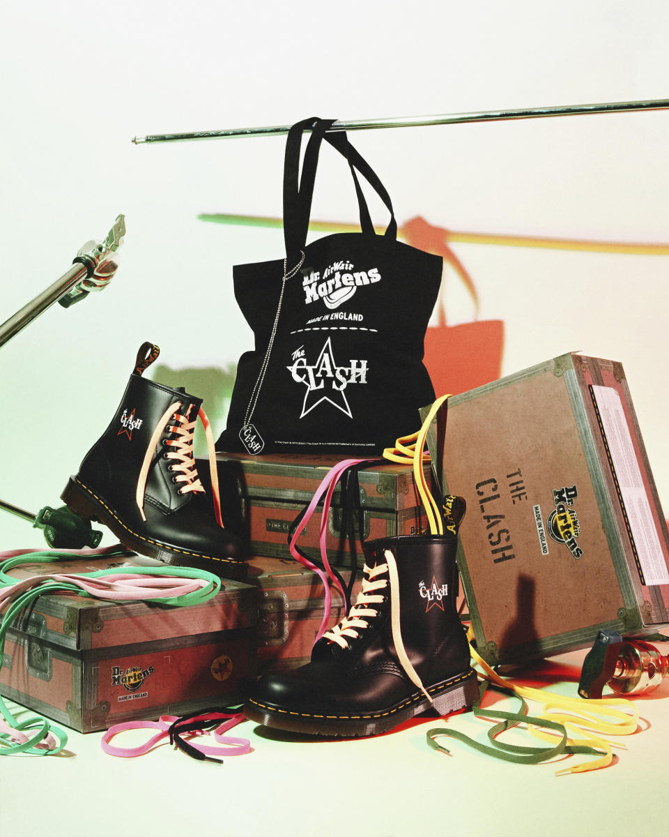 This image released by Doc Martens shows promotional art for a line of shoes, a collaboration between the iconic shoe maker and punk band The Clash. The heels are marked with The Clash’s logo and each pair comes equipped with a set of dog tags based on those worn by the band and seven sets of laces inspired by the colors of their most iconic albums. (Doc Martens via AP)
