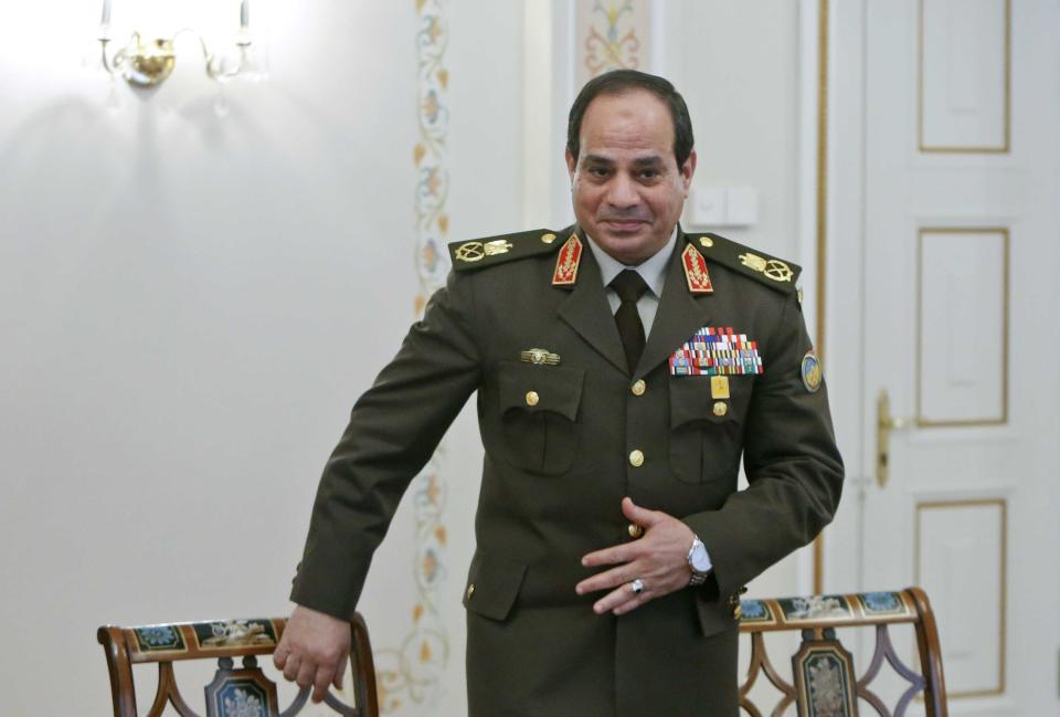 Egyptian Army chief Field Marshal Abdel Fattah al-Sisi arrives at a meeting with Russian President Vladimir Putin at the Novo-Ogaryovo state residence outside Moscow, Thursday, Feb. 13, 2014. Russian President Vladimir Putin on Thursday wished Egypt's military chief victory in the nation's presidential vote as Moscow sought to expand its military and other ties with a key U.S. ally in the Middle East. (AP Photo/ Maxim Shemetov, Pool)