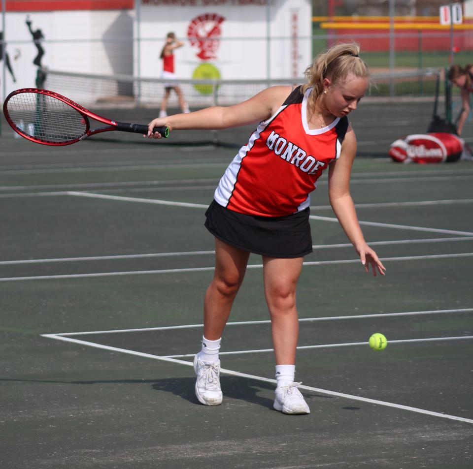 Bella Cicero prepares to serve for Monroe against Bedford Wednesday.