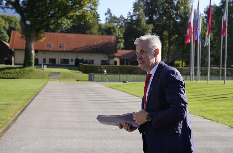 Latvia's Defense Minister Artis Pabriks arrives for a meeting of EU defense ministers at the Brdo Congress Center in Kranj, Slovenia, Thursday, Sept. 2, 2021. The collapse of Afghanistan's government, the Taliban's takeover of the country, and the rush to evacuate European citizens and Afghan employees have highlighted the European Union's need for its own rapid-reaction military force, senior EU officials say. (AP Photo/Darko Bandic)