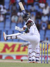 West Indies' wicketkeeper Shai Hope eyes the ball of a shot played by India's Ajinkya Rahane during day one of the first Test cricket match at the Sir Vivian Richards cricket ground in North Sound, Antigua and Barbuda, Thursday, Aug. 22, 2019. (AP Photo/Ricardo Mazalan)