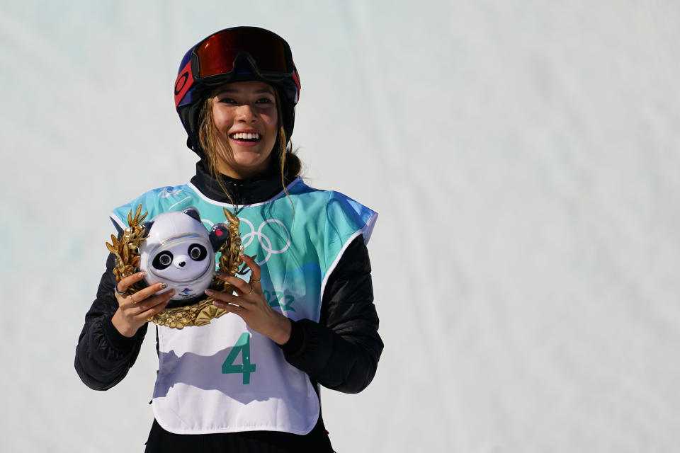 Gold medalist Eileen Gu, of China, poses after the women’s freestyle skiing big air finals of the 2022 Winter Olympics. - Credit: AP