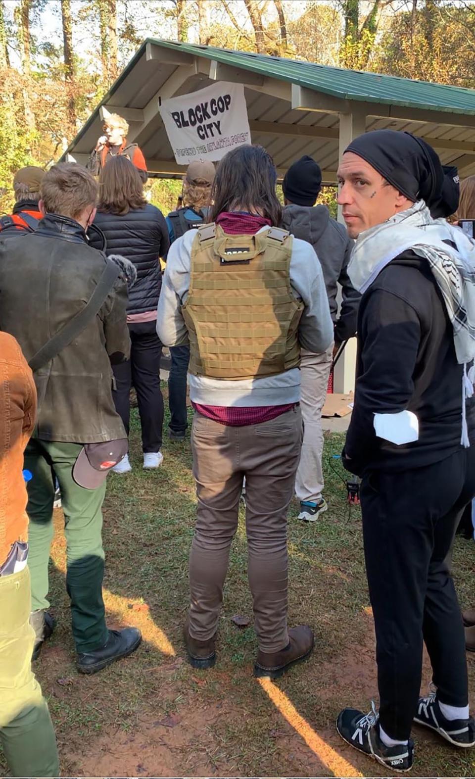 <br>Chambers marching with protesters at Cop City in Atlanta